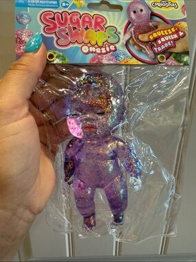 Sugar Swaps Onesie Purple Glitter Squeeze Toy
